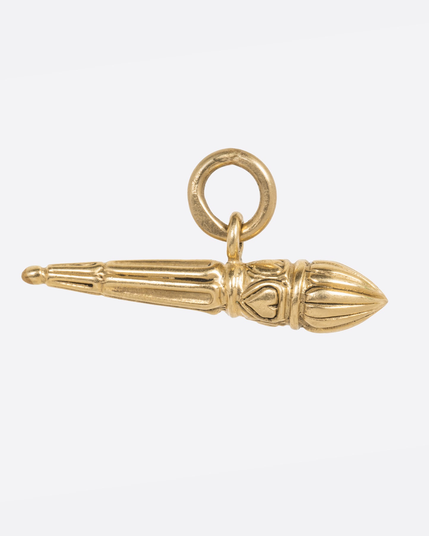 A yellow gold torch charm, shown from the side.
