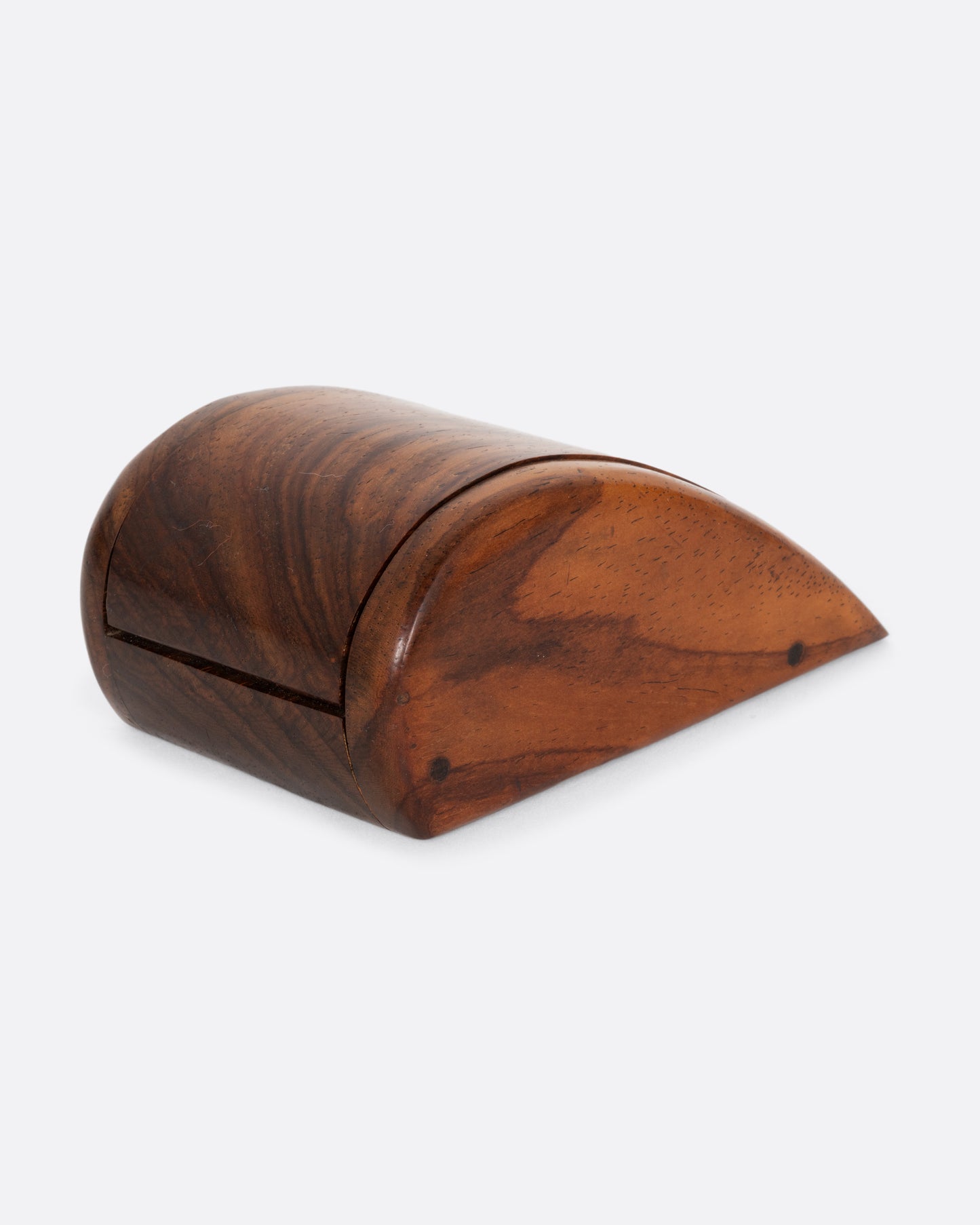 A curved wooden box shown closed from the back.