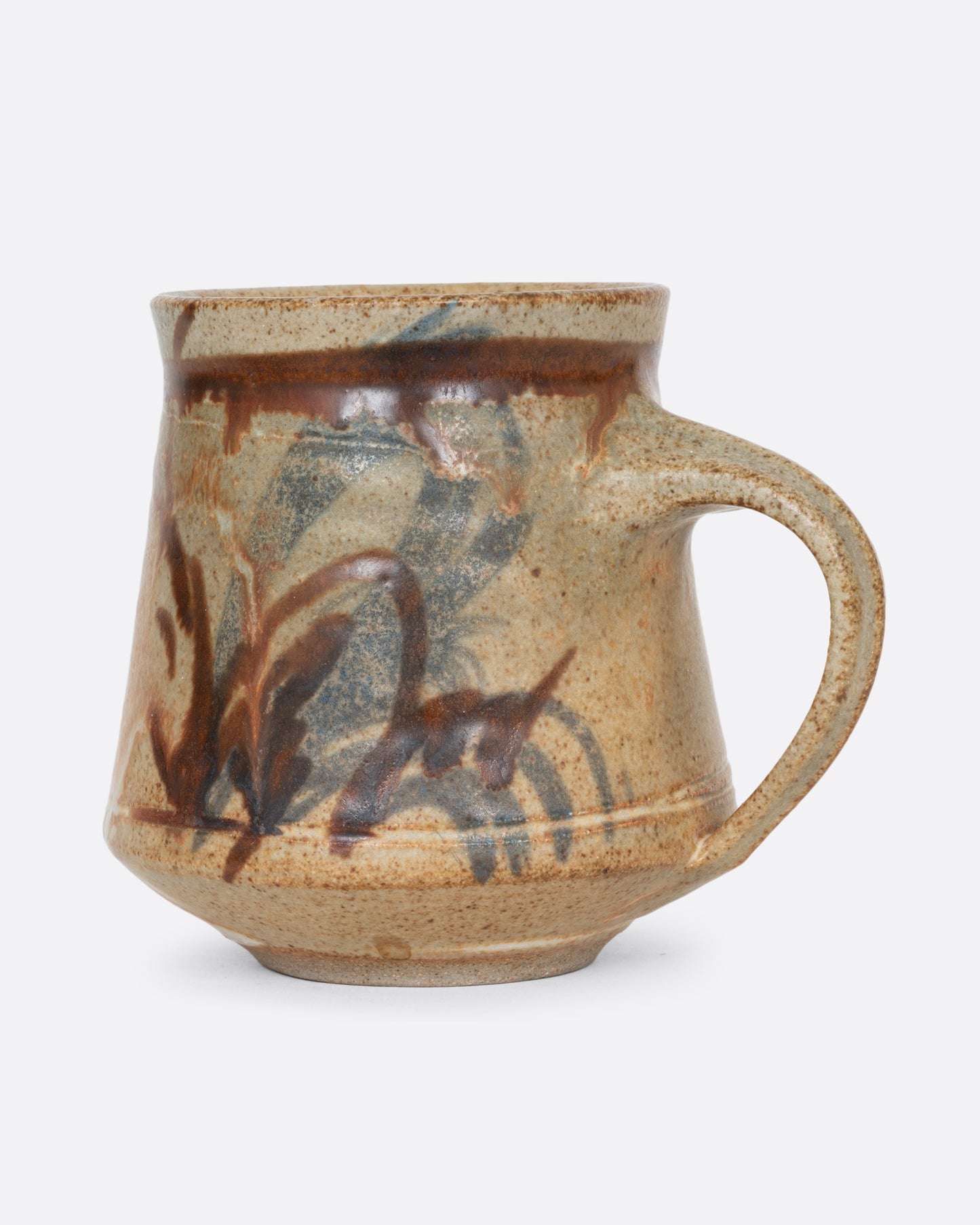Four handmade ceramic mugs with blue and brown brushstrokes. Shown from the side.