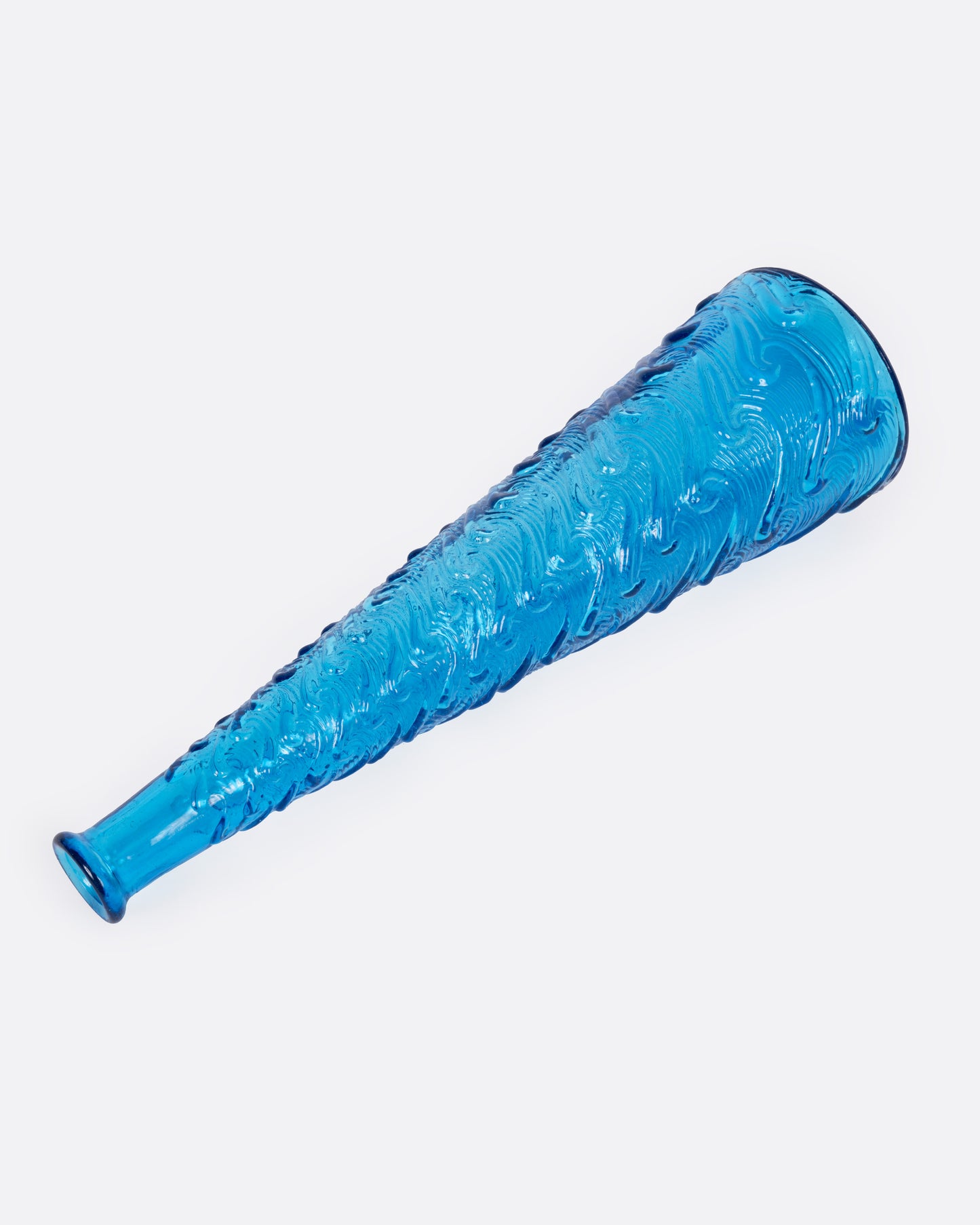 A tall tapered cerulean glass vase with a wavy textured exterior, shown from the side.