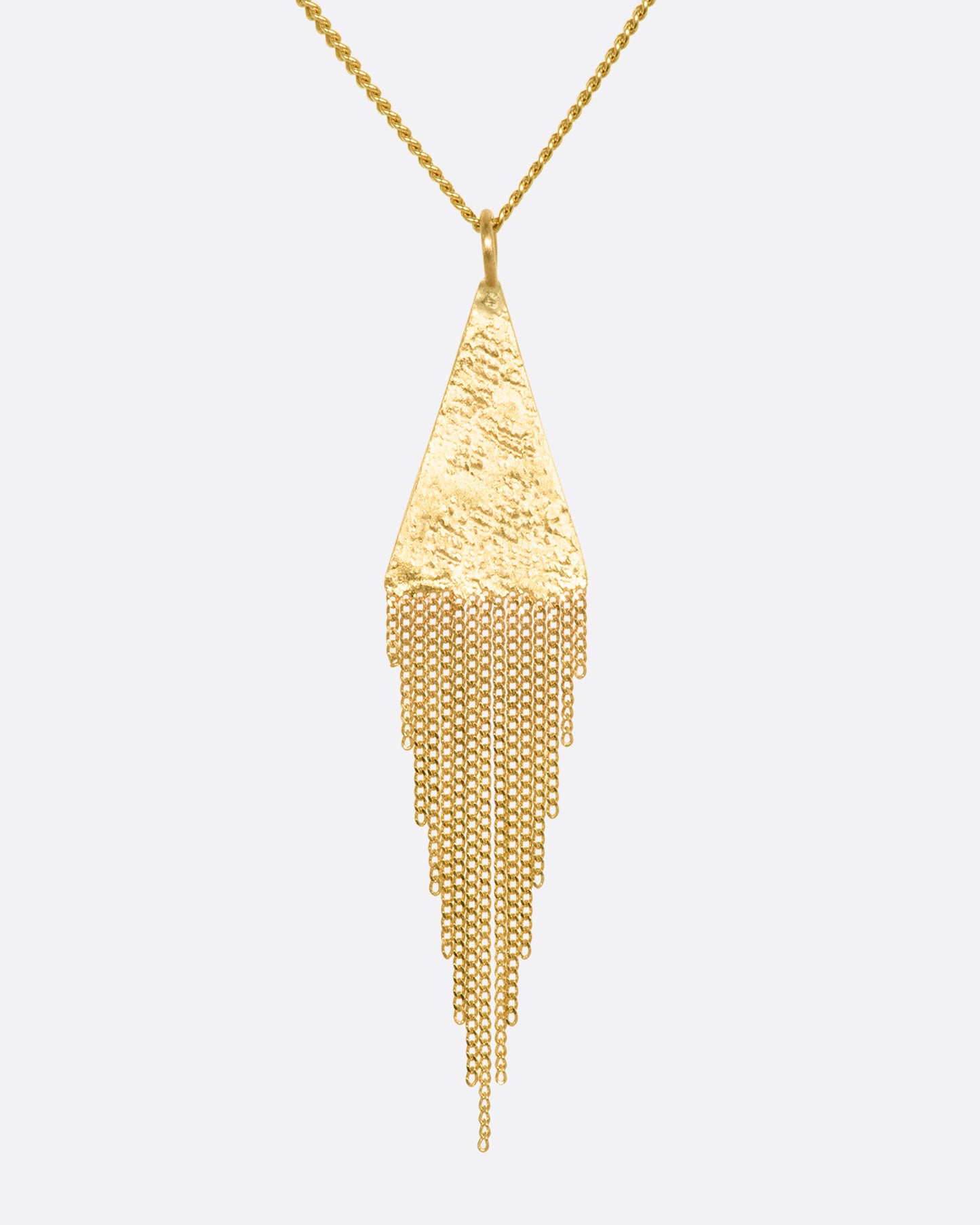 A yellow gold necklace with a fringed triangle pendant. View up close from the front.