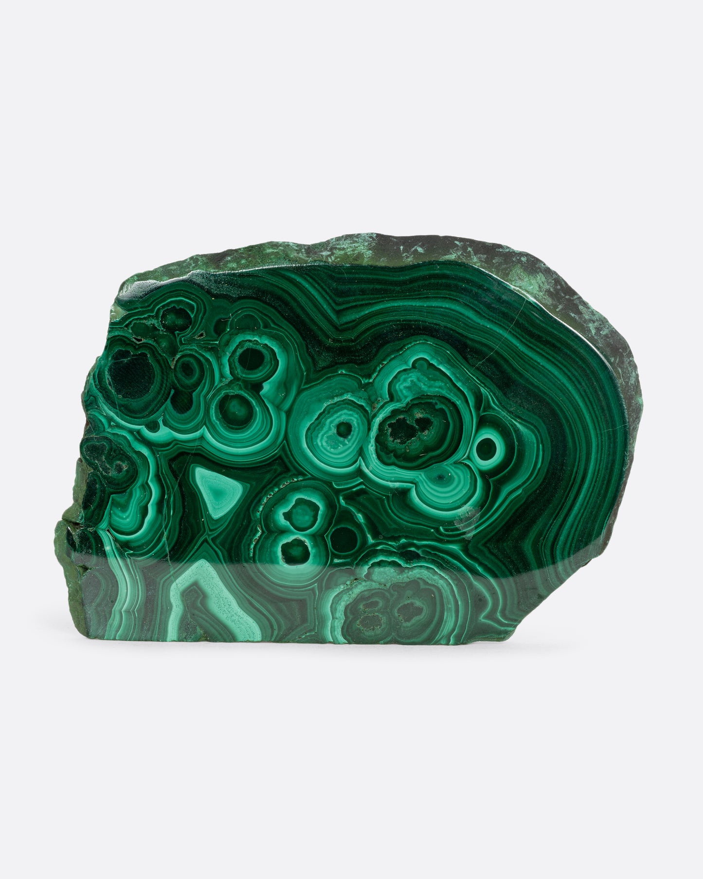 A slab of lush malachite shown from the front.