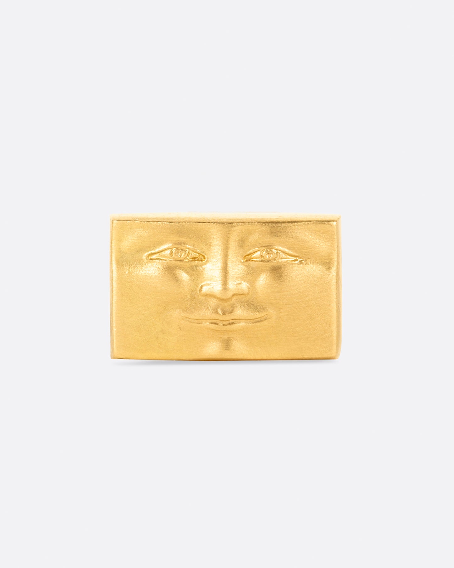 A tiny, smiling, rectangular face to adorn your ear.