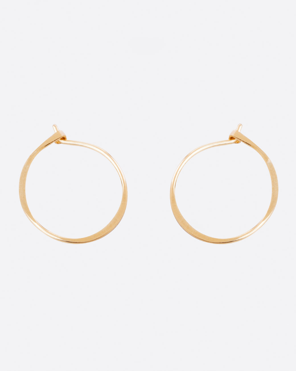 Fairmined gold, hand-hammered round hoop earrings that close upon themselves.