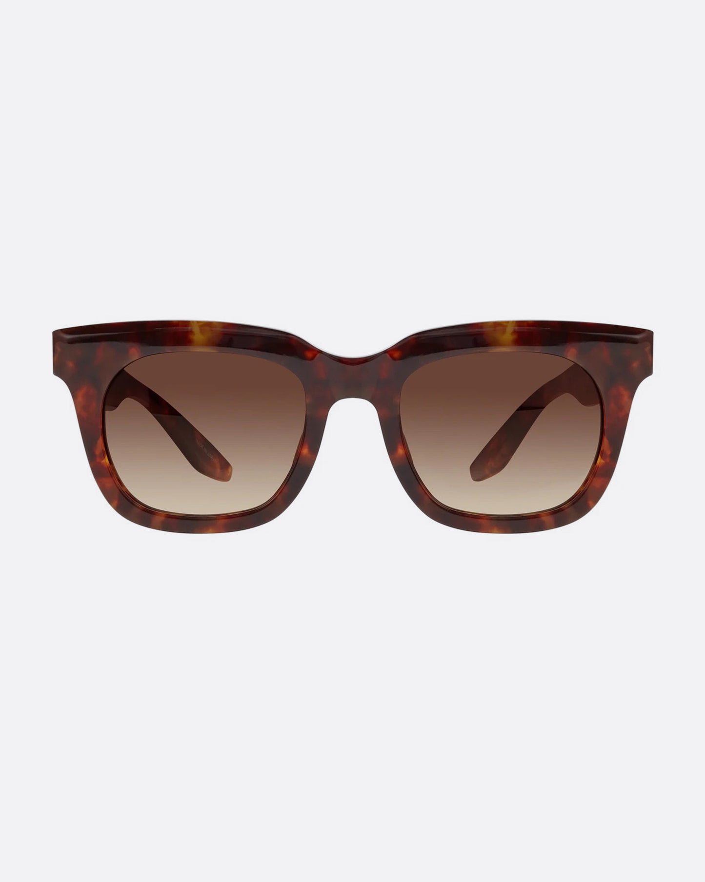 A pair of sunglasses with brown frames and brown gradient lenses. Shown from the front.
