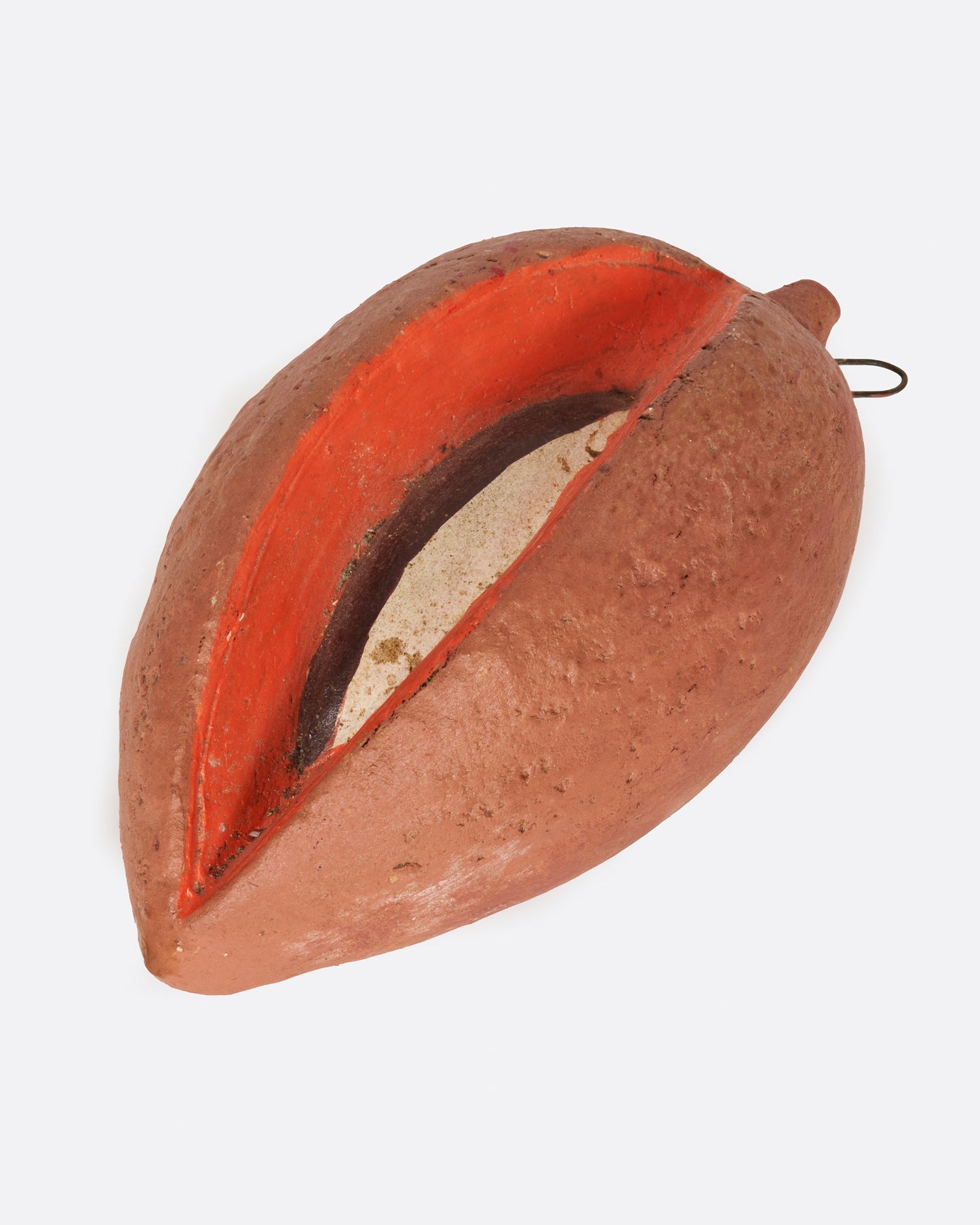 A vintage handmade sapote fruit bank from 1940's Mexico.