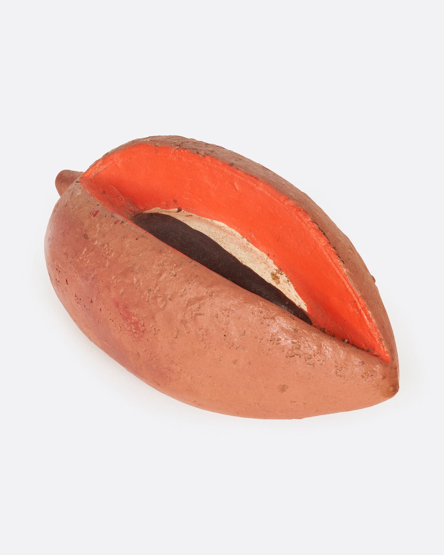 A vintage handmade sapote fruit bank from 1940's Mexico.