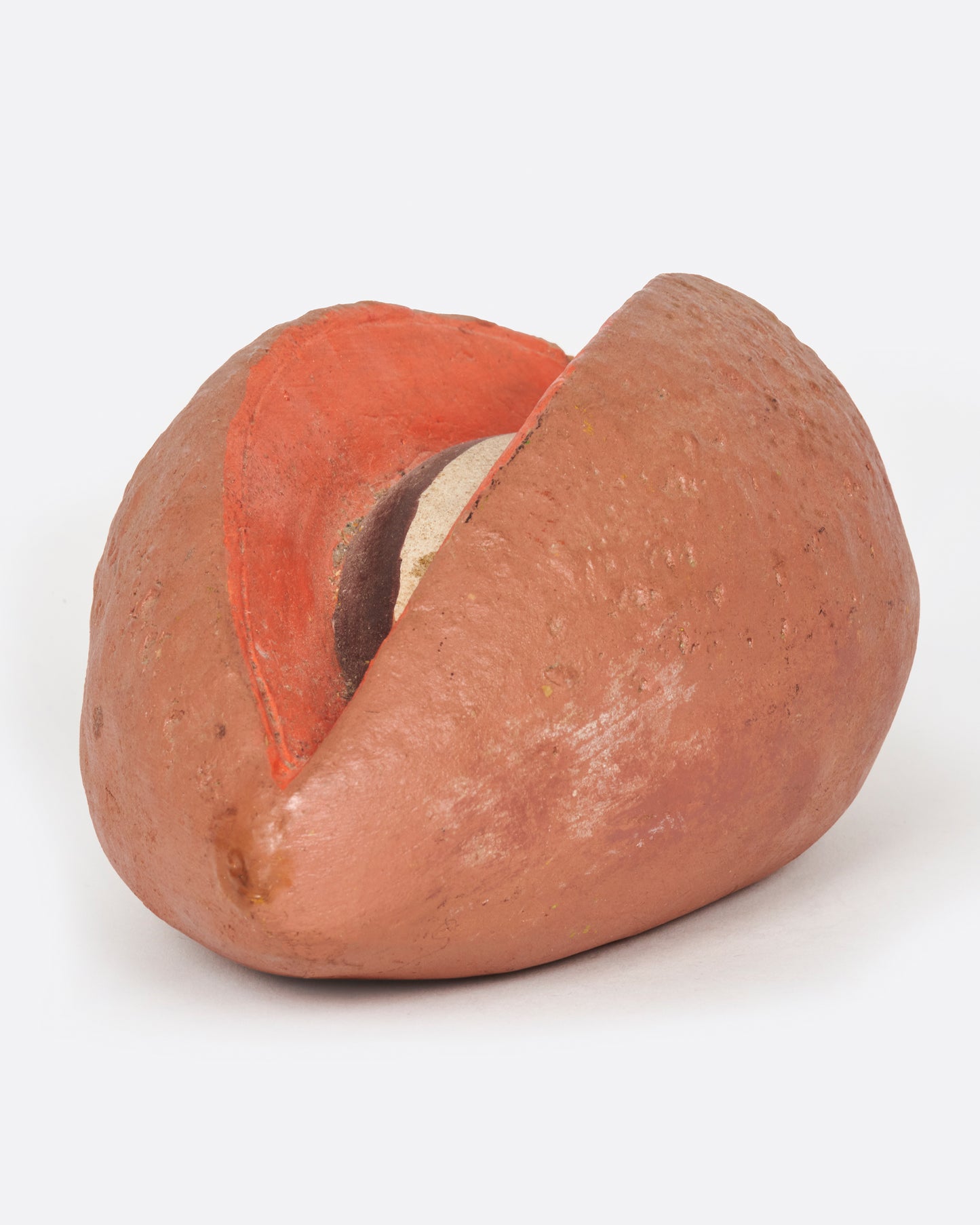 A vintage handmade sapote bank from 1940's Mexico.