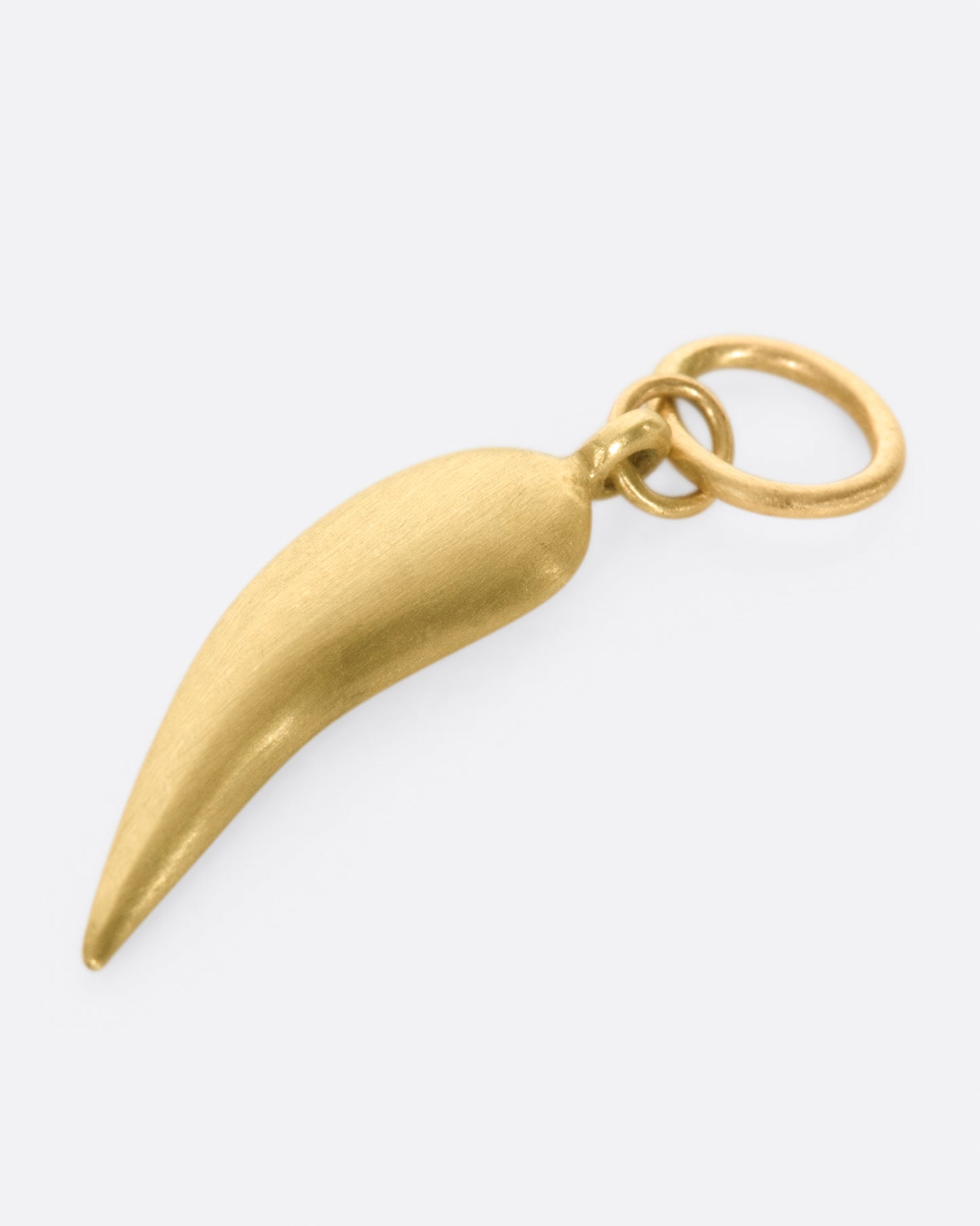 An homage to a classic Italian horn, lined with gray diamonds.