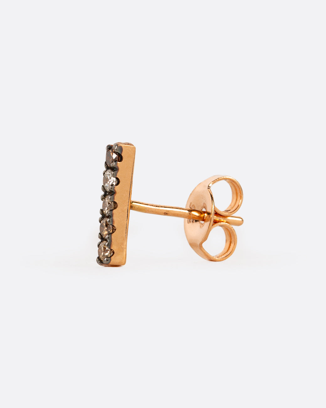 A rose gold bar stud earring with five diamonds in mixed shades of brown. Shown from the side.