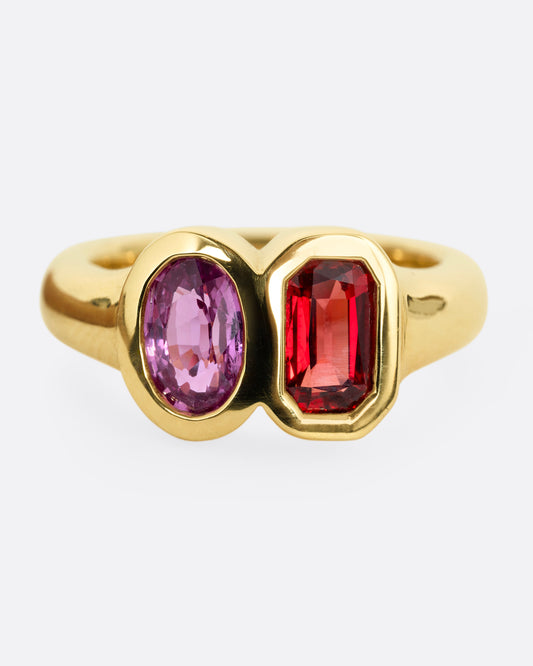 yellow gold ring with red and orange sapphires shown from the front 