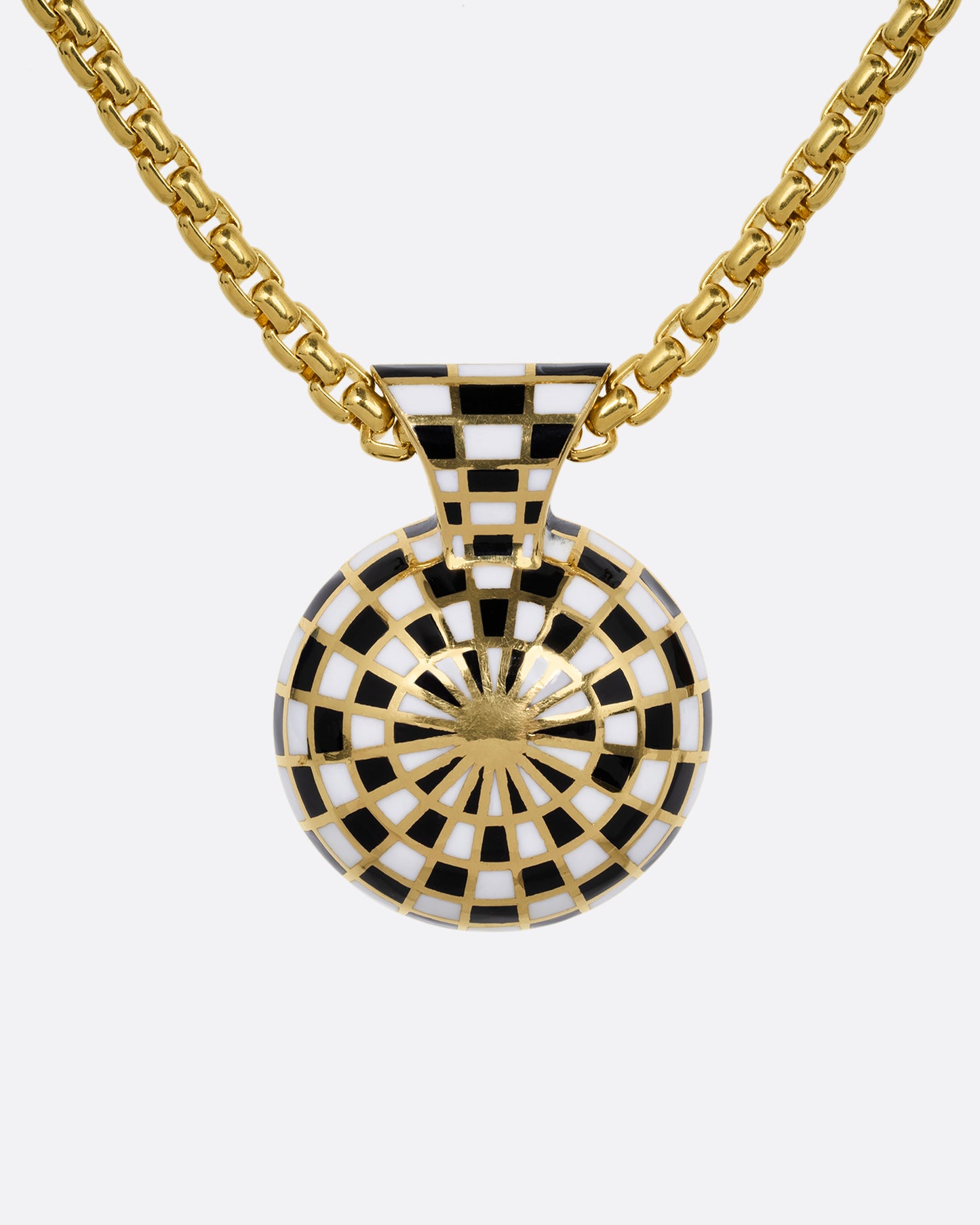 The backside of a pendant with a black and white enamel checkerboard pattern on a box chain. Shown from the back.