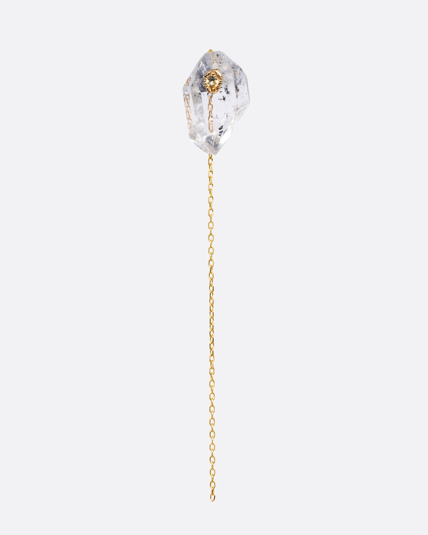 A pin and chain earring with a quartz and cable chain. Shown from the front.