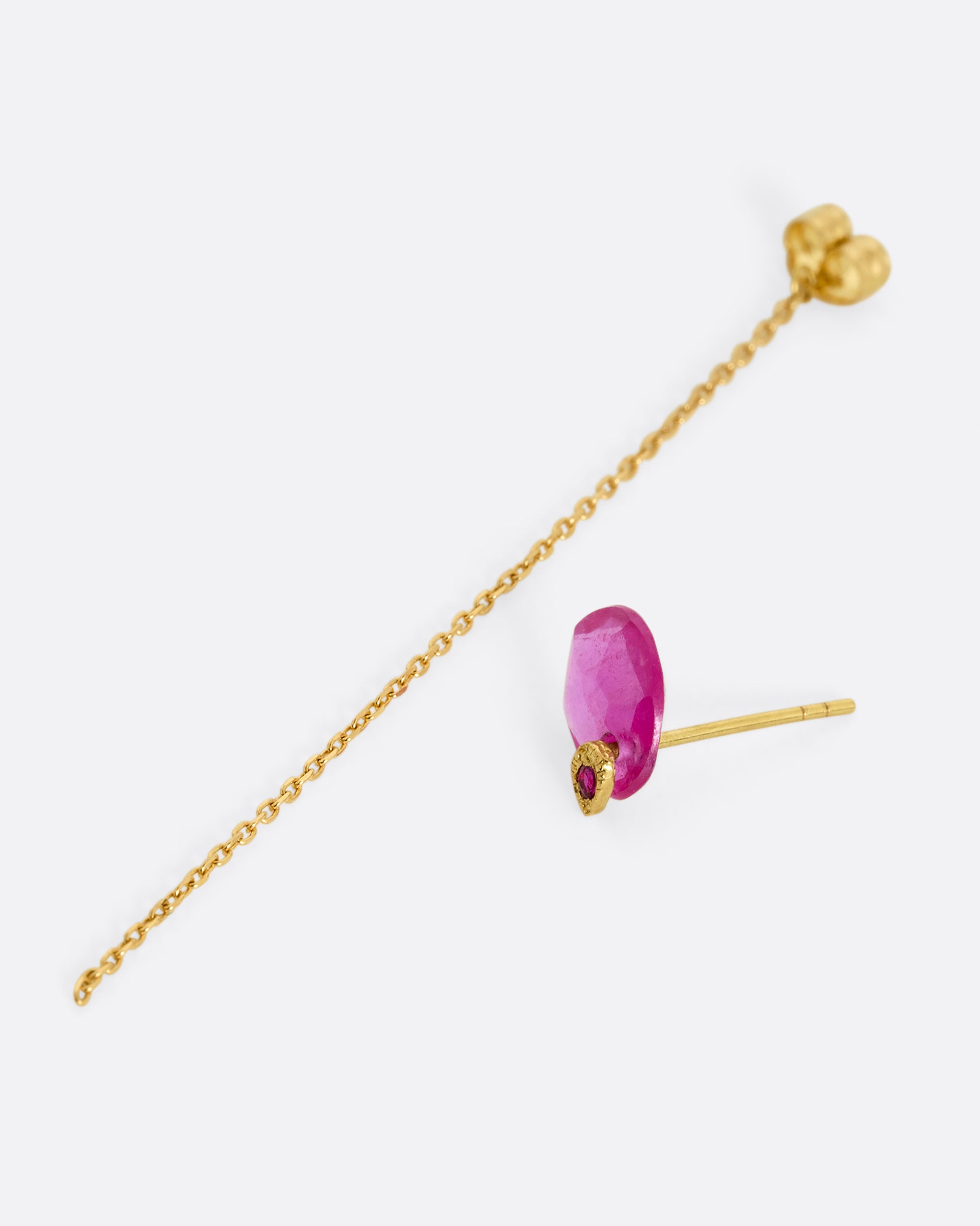 A pin and chain earring with a ruby and cable chain. Shown open from the side.