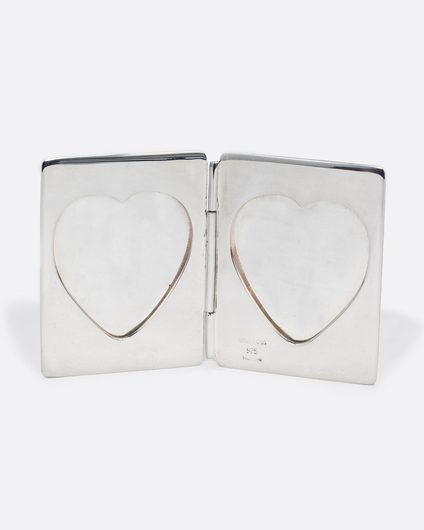 vintage sterling silver heart shaped frame shown open
