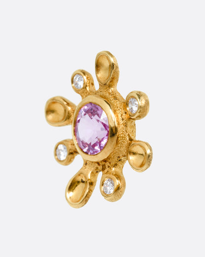 Yellow gold pink sapphire flower stud earrings, close view of the pink sapphire and the textured gold petals