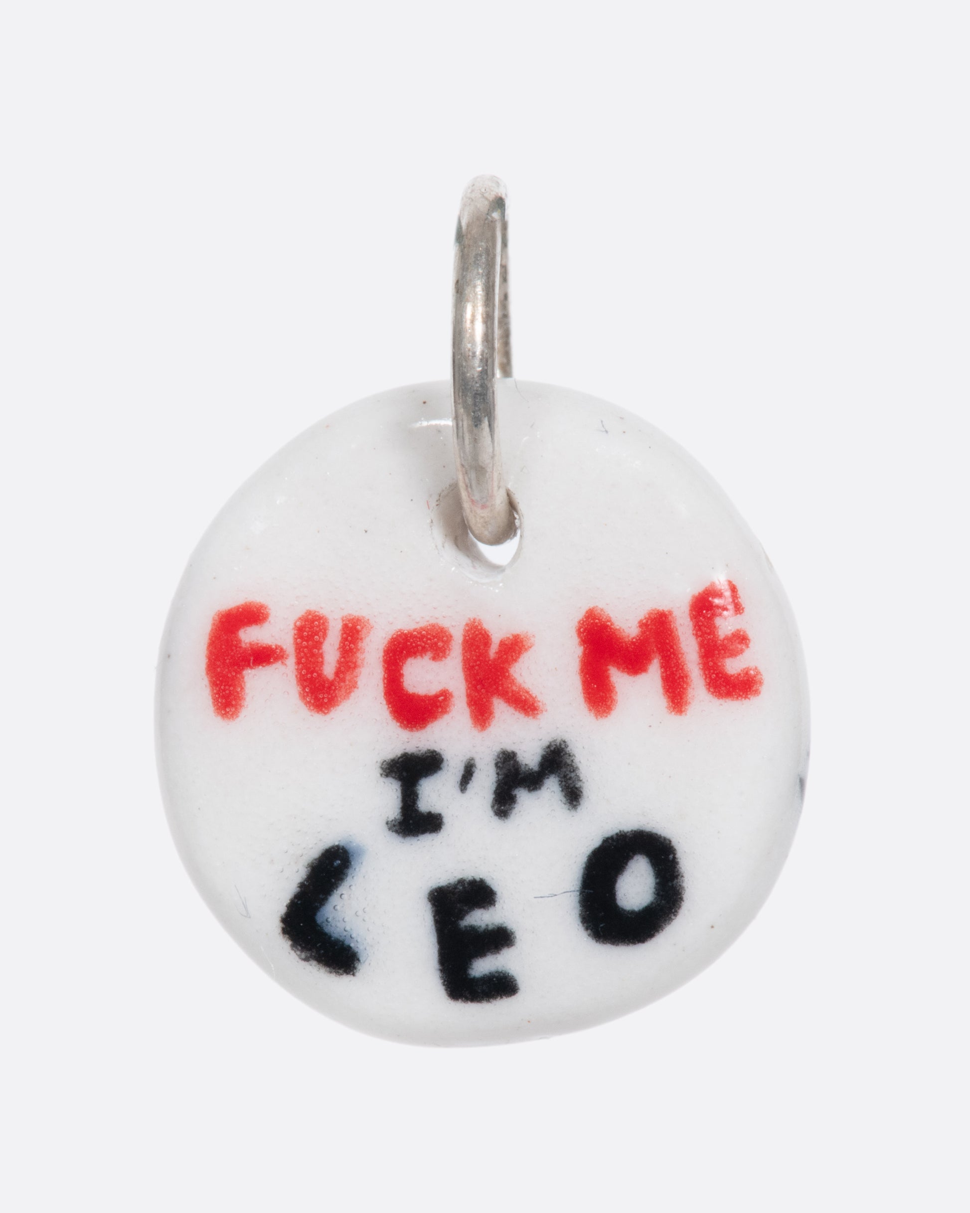 A handmade and painted porcelain zodiac disc charm with a sterling silver bail, featuring a sex position specific to each zodiac.