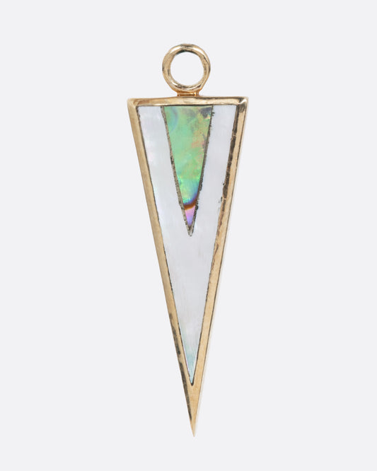 A yellow gold triangular dangle with the point facing down. It's inlaid with triangles of layered mother of pearl and abalone. Shown from the front.
