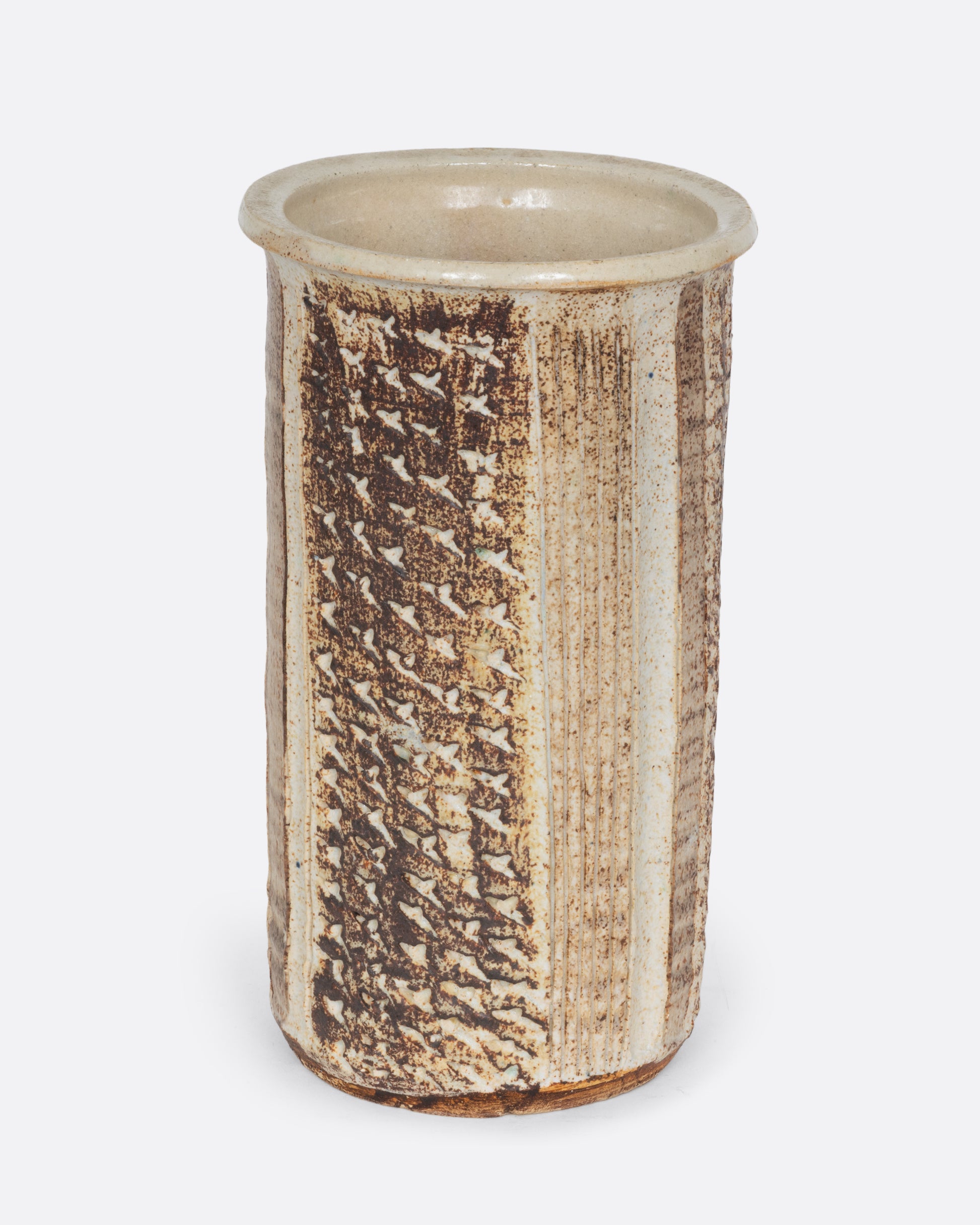 A tall textured tan vase. Shown from the front. 