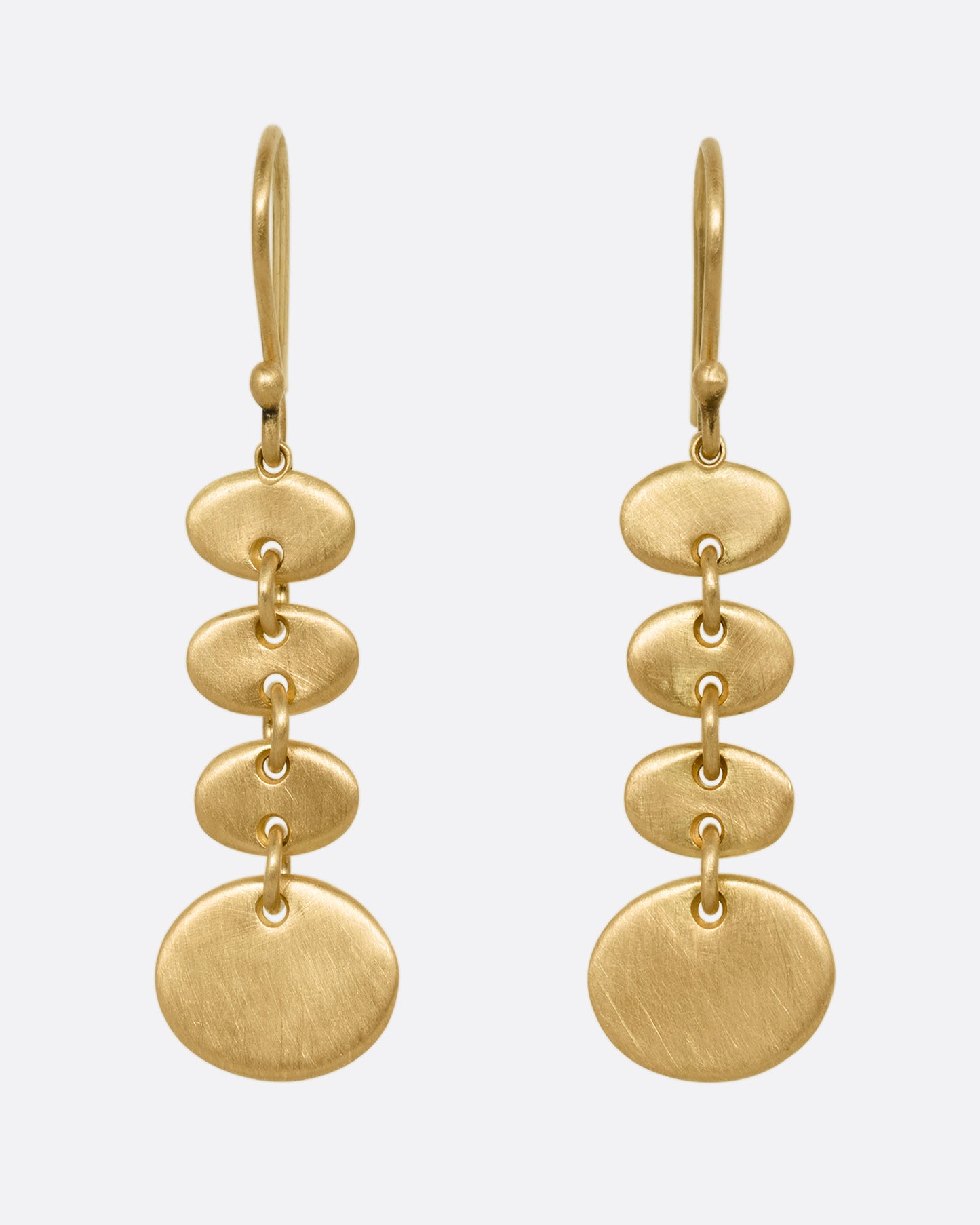 A yellow gold pair of earrings with linked graduated ovals. Shown from the front.
