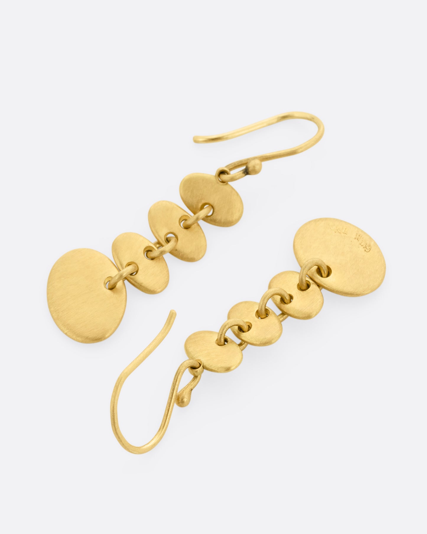 A yellow gold pair of earrings with linked graduated ovals. One earring is shown from the front, the other is shown from the back.