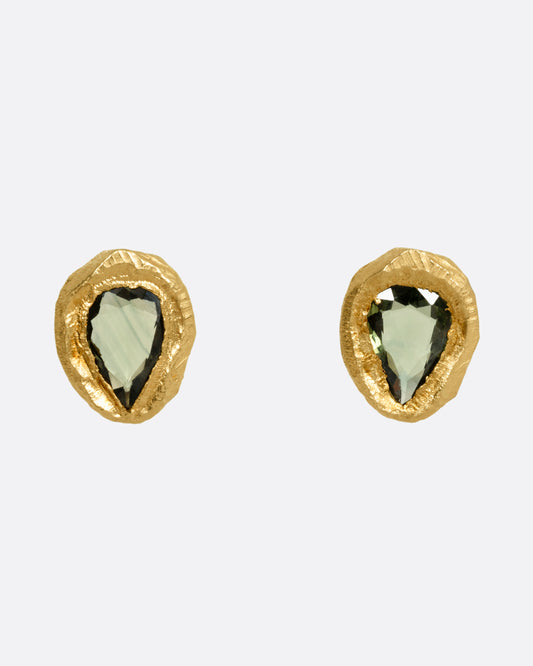 A pair of yellow gold stud earrings with teardrop shaped green sapphires, shown from the front.