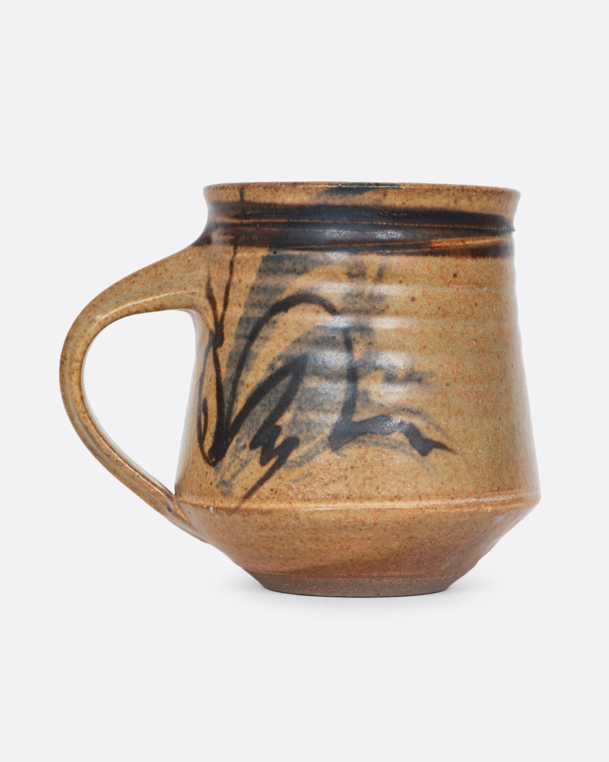 Four handmade ceramic mugs with blue and brown brushstrokes. Shown from the side.
