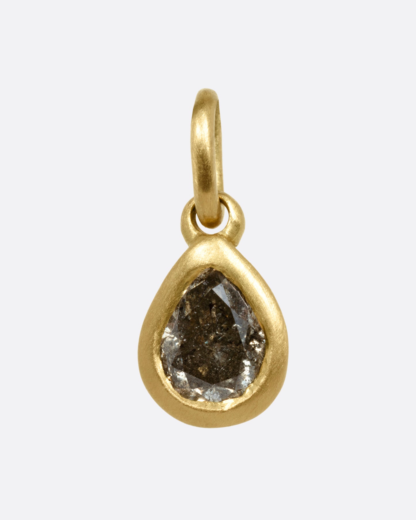 A yellow gold pendant with a pear shaped grey diamond, shown from the front.