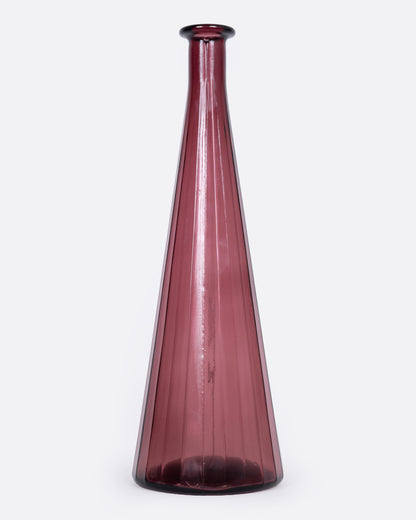 A tall tapered purple glass vase, shown from the front.