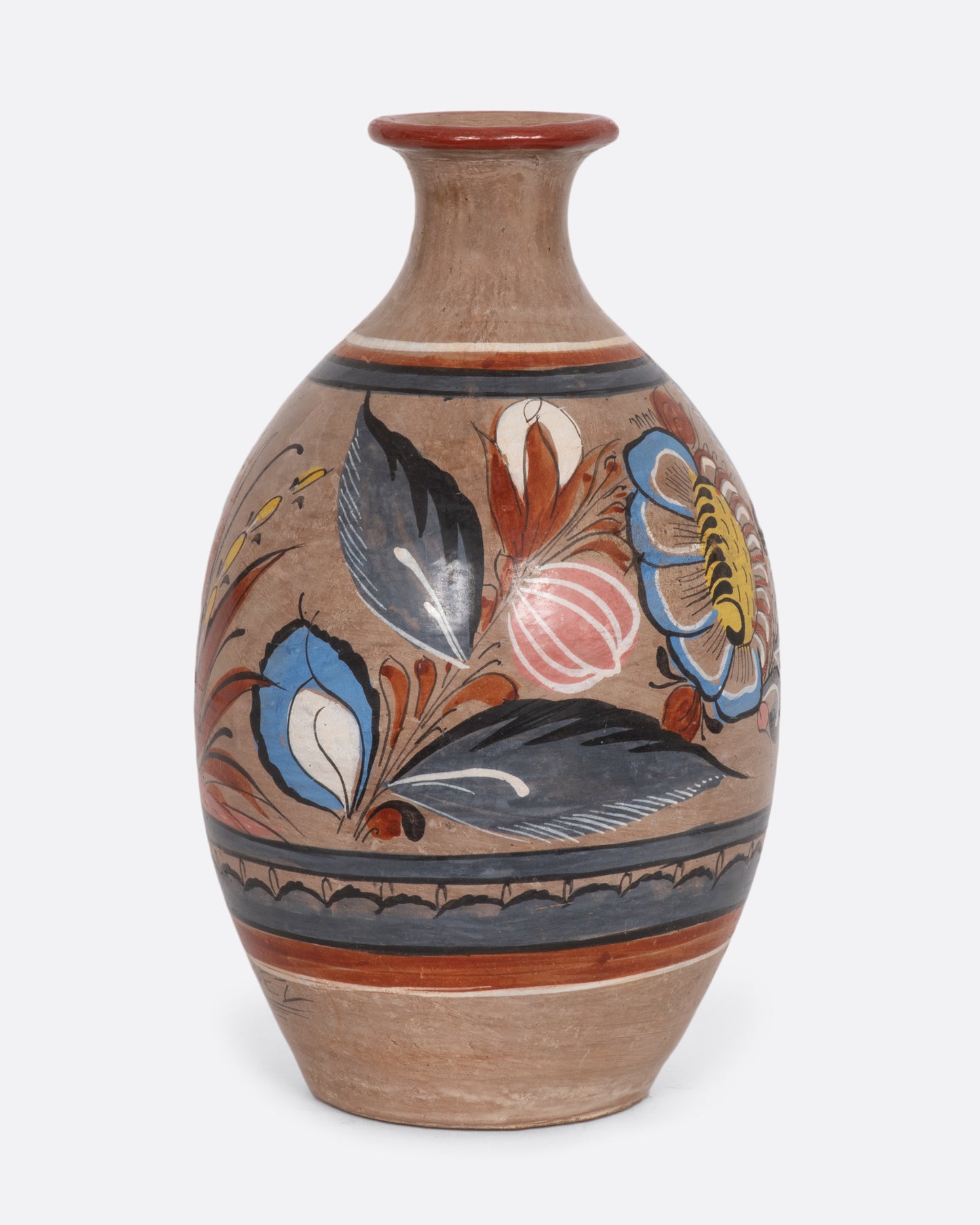 Mexican cceramic tonala vase with painted flowers and owl. View of the flower.