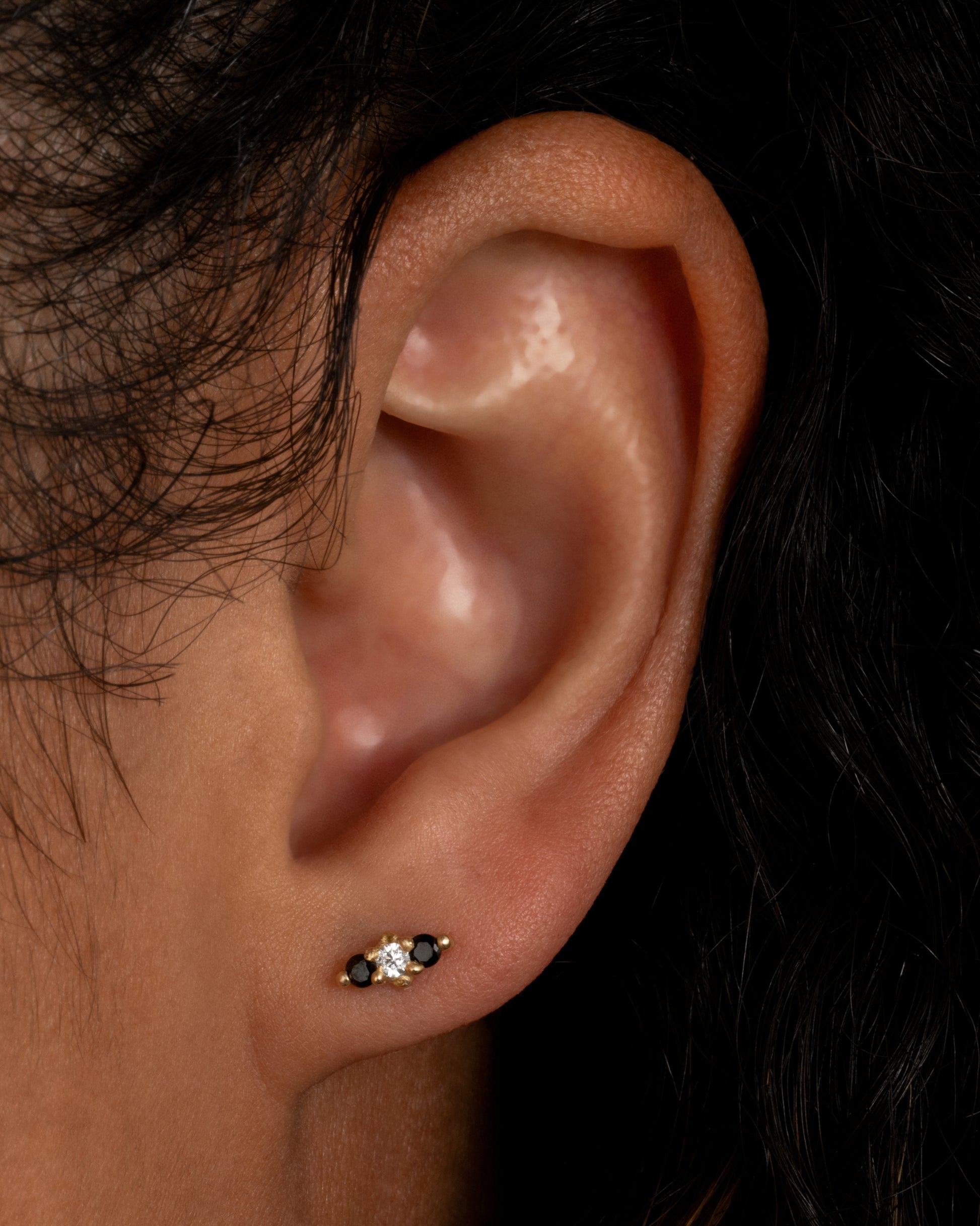This small stud is a bold take on the classic trio style.