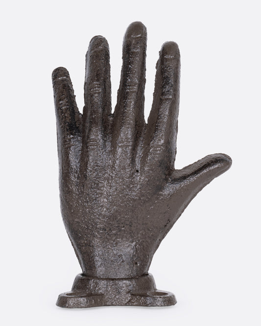 Vintage hand wall hook in dark cast iron, an open hand standing upright