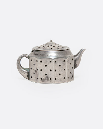 Vintage silver teapot tea infuser, side view