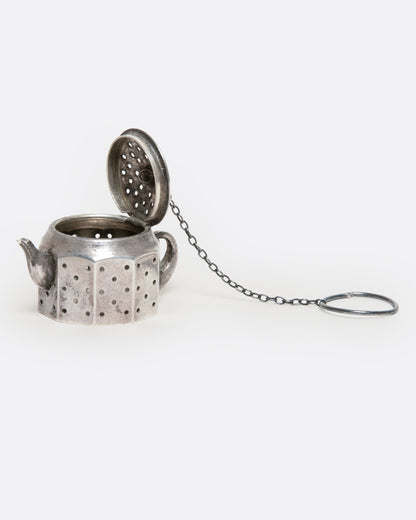 Vintage silver teapot tea infuser, shown with the lid open