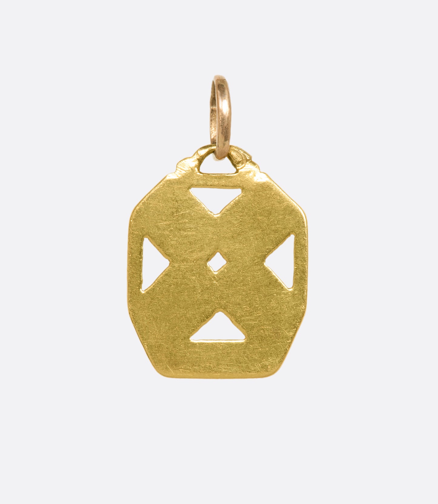 A yellow gold royal flush card charm. View from the back.