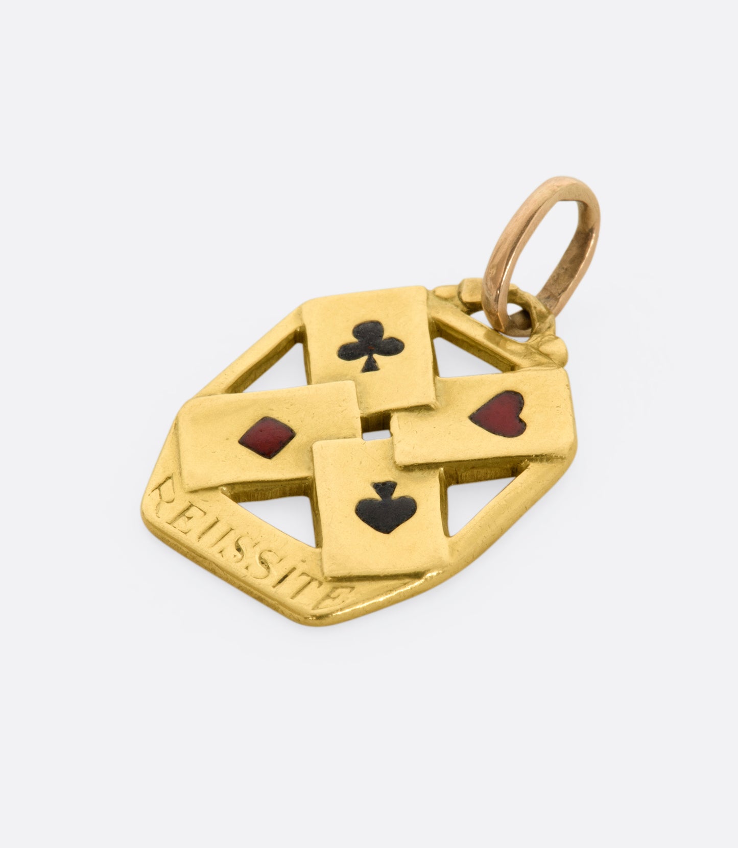 A yellow gold royal flush card charm. View laying flat.