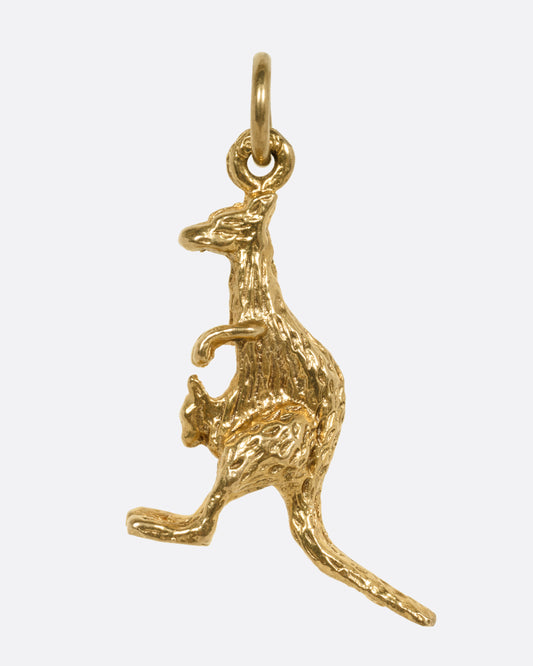 A yellow gold kangaroo and baby joey pendant, shown from the front.