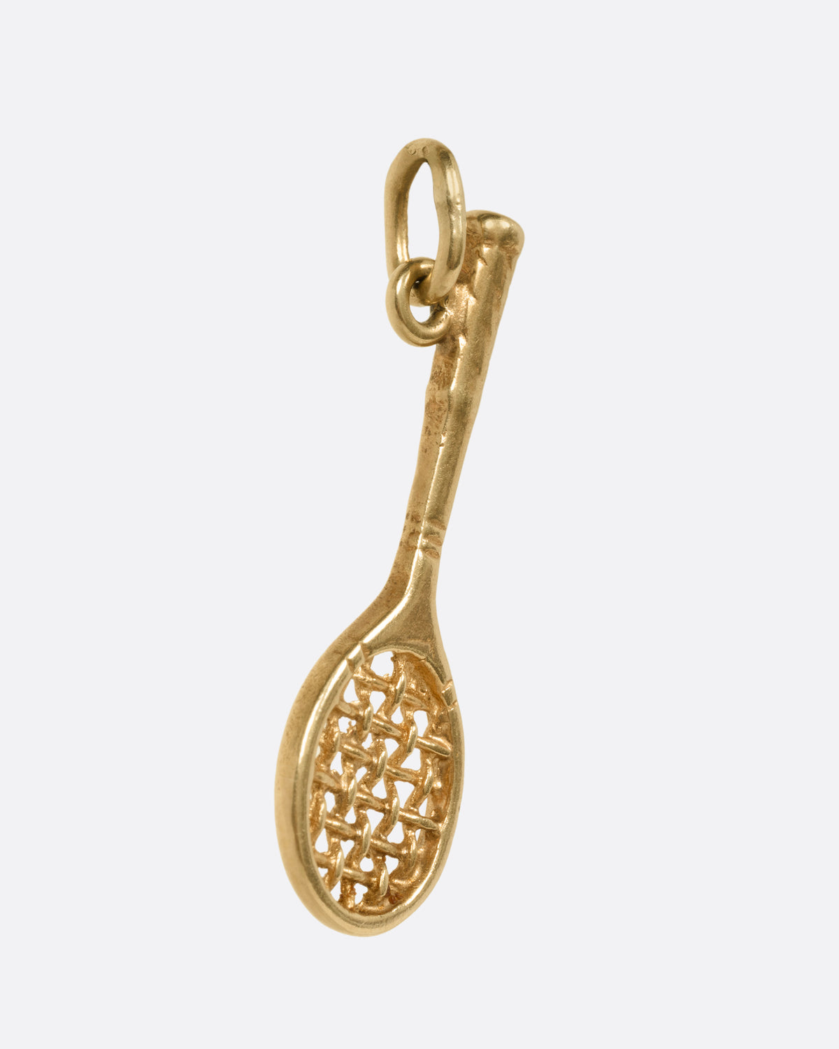 A gold tennis racket pendant charm with a woven string design, shown from the side.