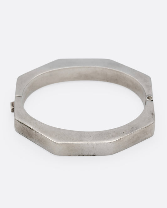 A silver octagonal bangle bracelet, shown from the front.