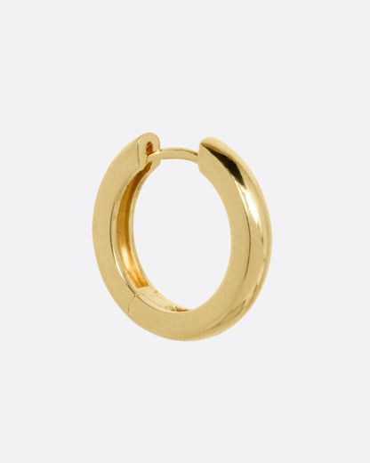 Yellow gold huggie hoop earring, front view of the open hoop