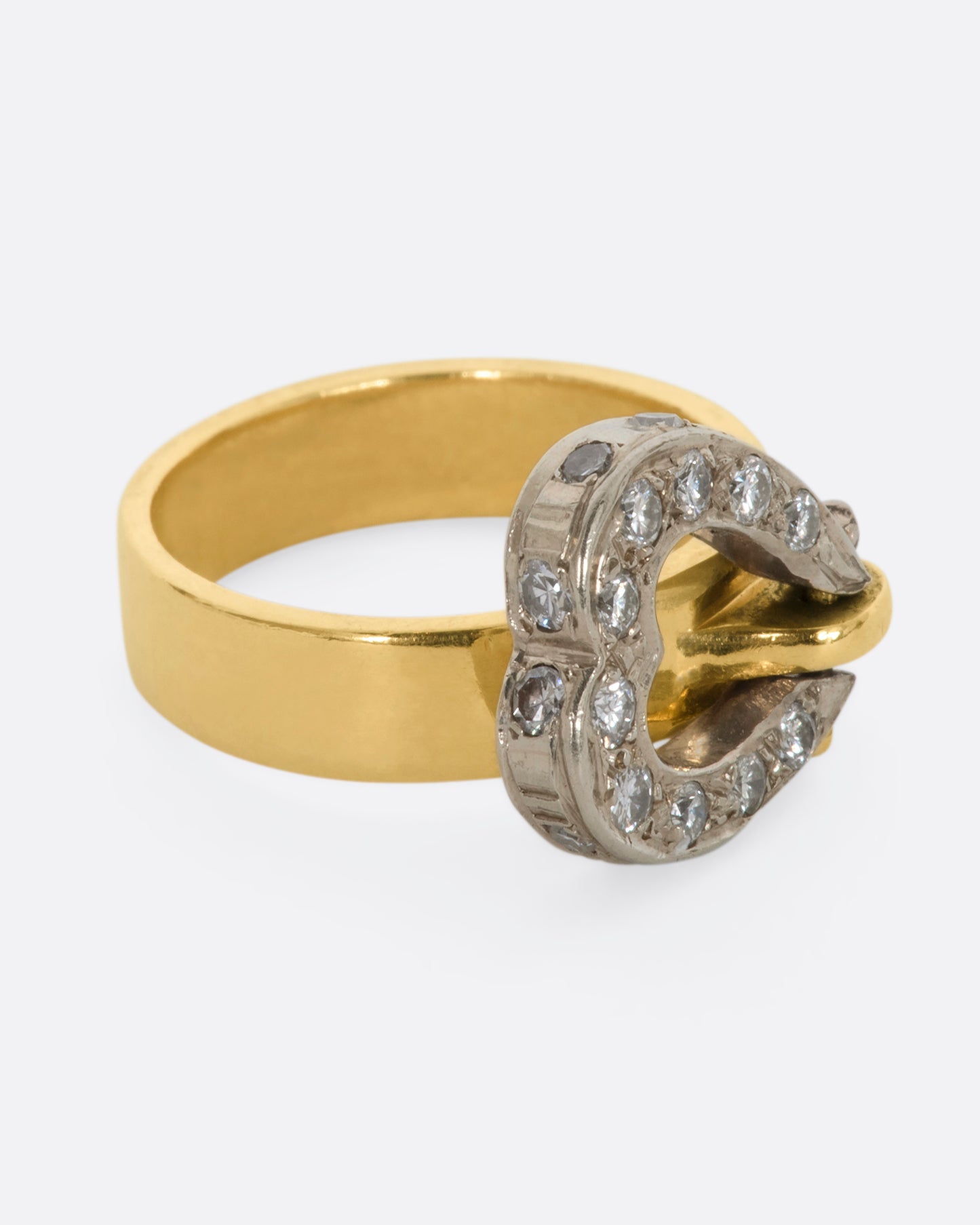 Yellow gold diamond hinged heart ring. View from the side.