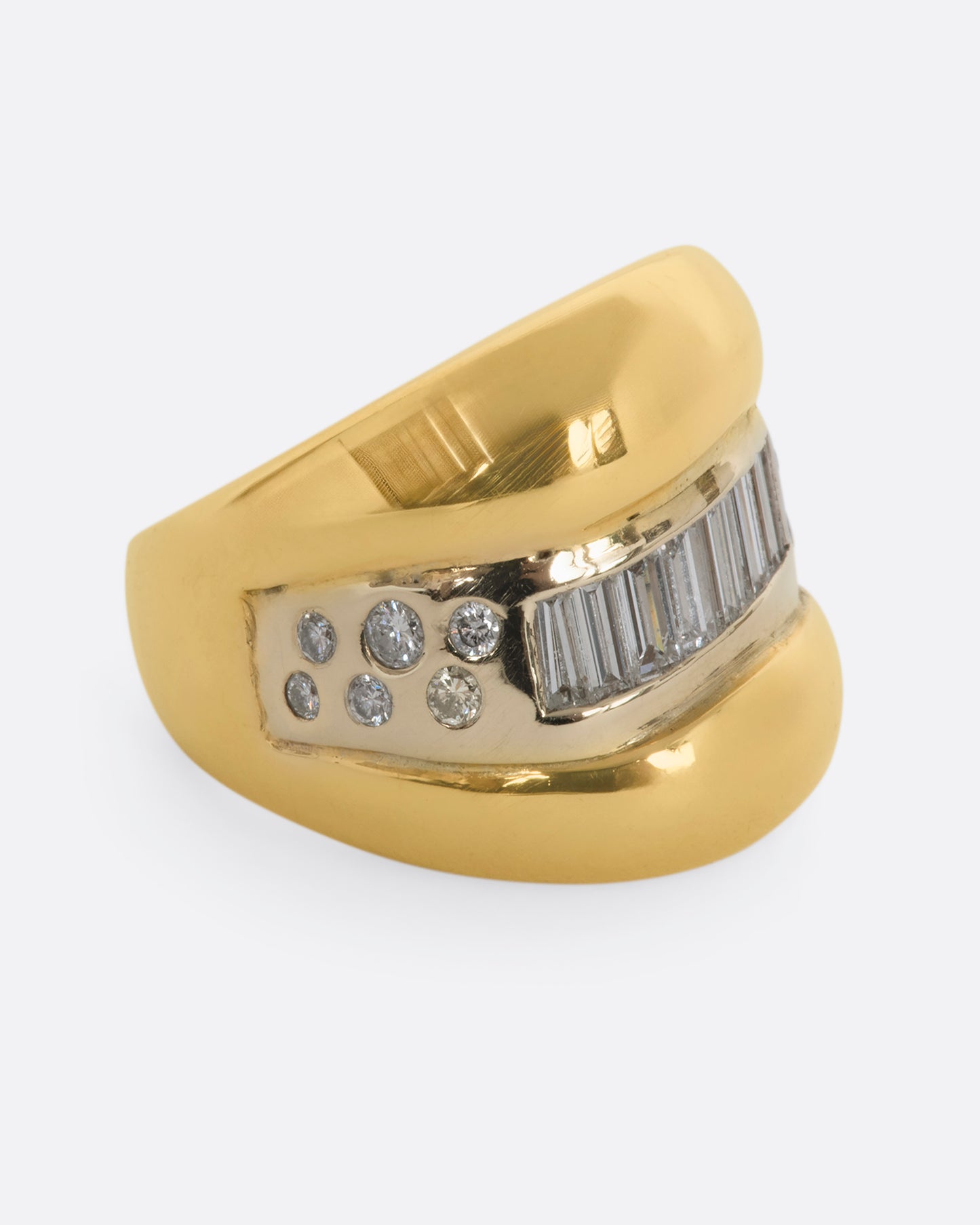 Yellow gold wide band bubble ring with baguette and round diamonds. View from the alternate side.