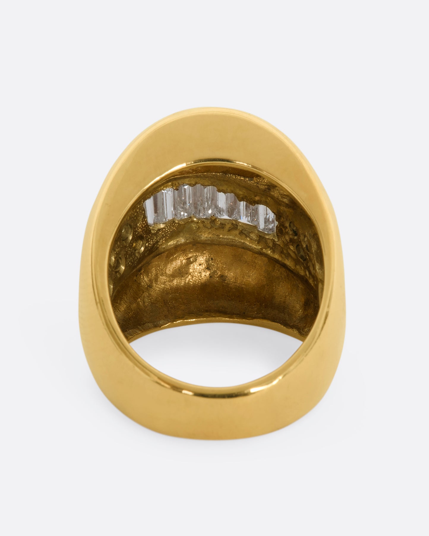 Yellow gold wide band bubble ring with baguette and round diamonds. View from the back.