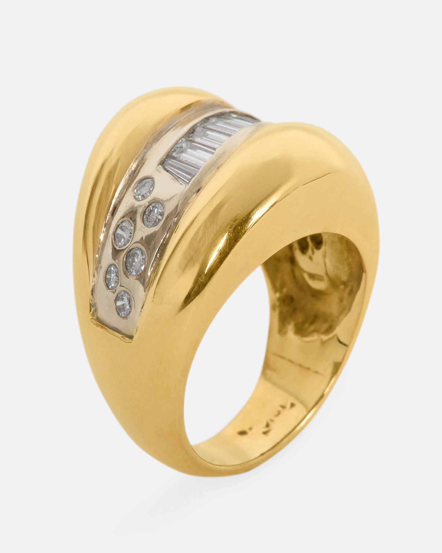 Yellow gold wide band bubble ring with baguette and round diamonds. View standing up.