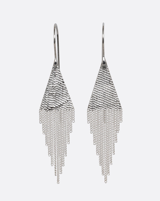 A pair of silver drop earrings with triangular tops and cable chain fringe bottoms. Shown from the front.