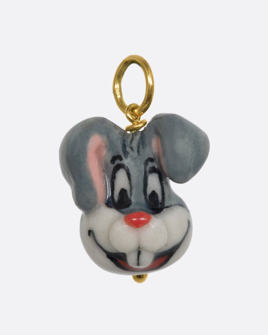 A grey three dimensional bugs bunny charm with a yellow gold bail. View from the front.