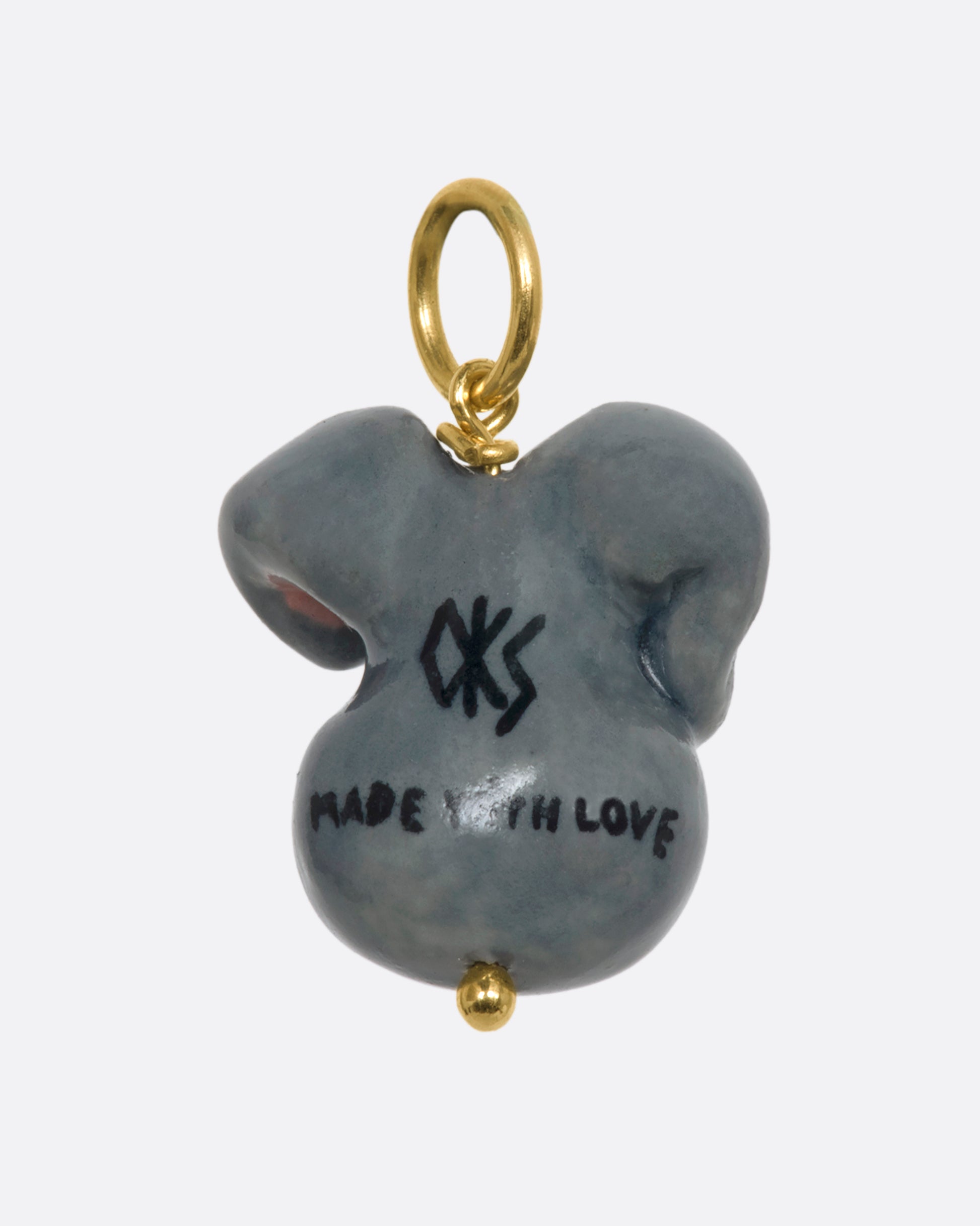 A grey three dimensional bugs bunny charm with a yellow gold bail. View from the back.