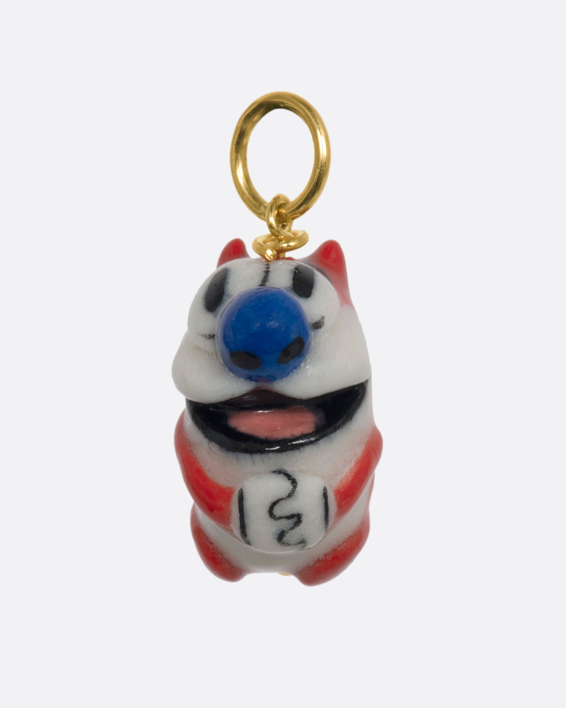 A three dimensional Stimpy charm with a yellow gold bail. View from the front.