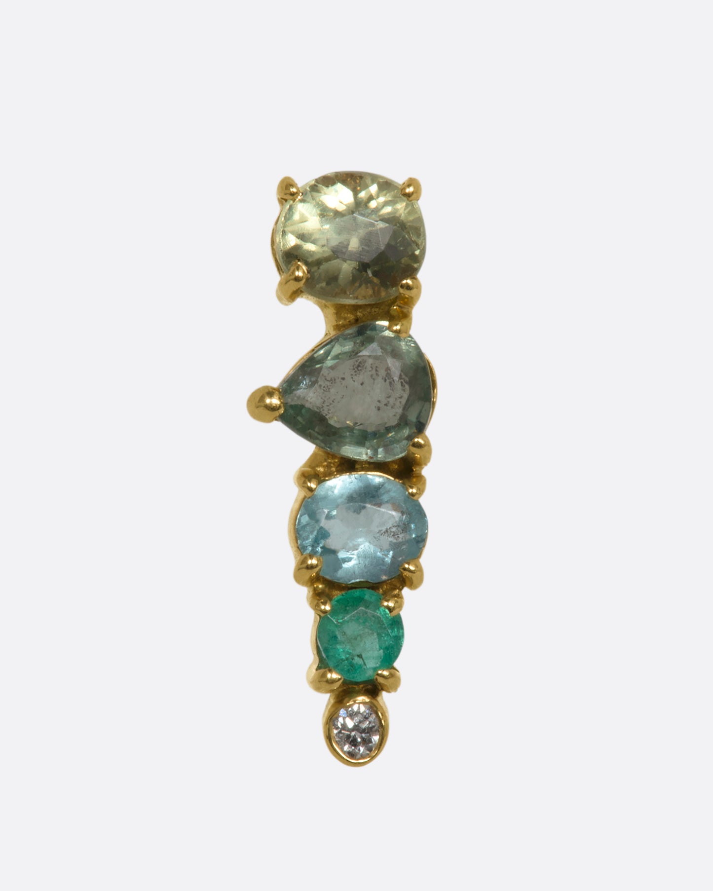 A yellow gold stud earring with a mosaic of emerald, sapphire, tourmalines and diamonds. Shown from the front.