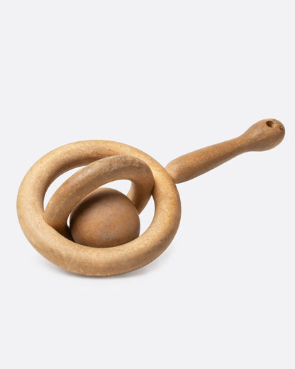 Vintage carved wood baby rattle, angled view of the ring and ball